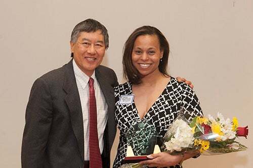 Laura Anderson Wright, the 2014 outstanding woman of color winner with President Loh.